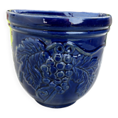 Wall pot in glazed blue terracotta with a grape design, 1970s.