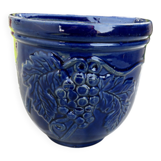 Wall pot in glazed blue terracotta with a grape design, 1970s.