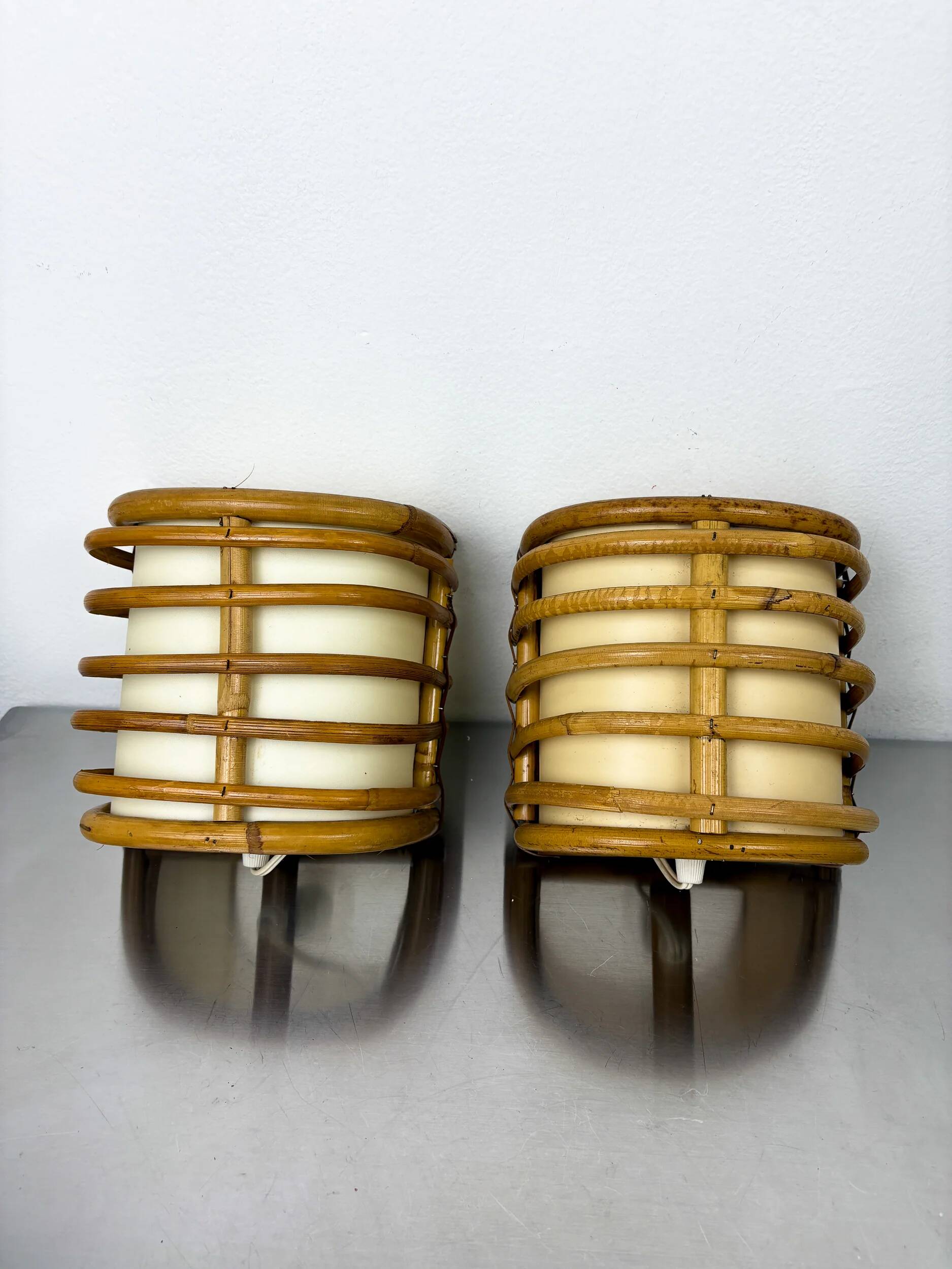 Pair of mid-century rattan wall sconces, 1960s, Italy