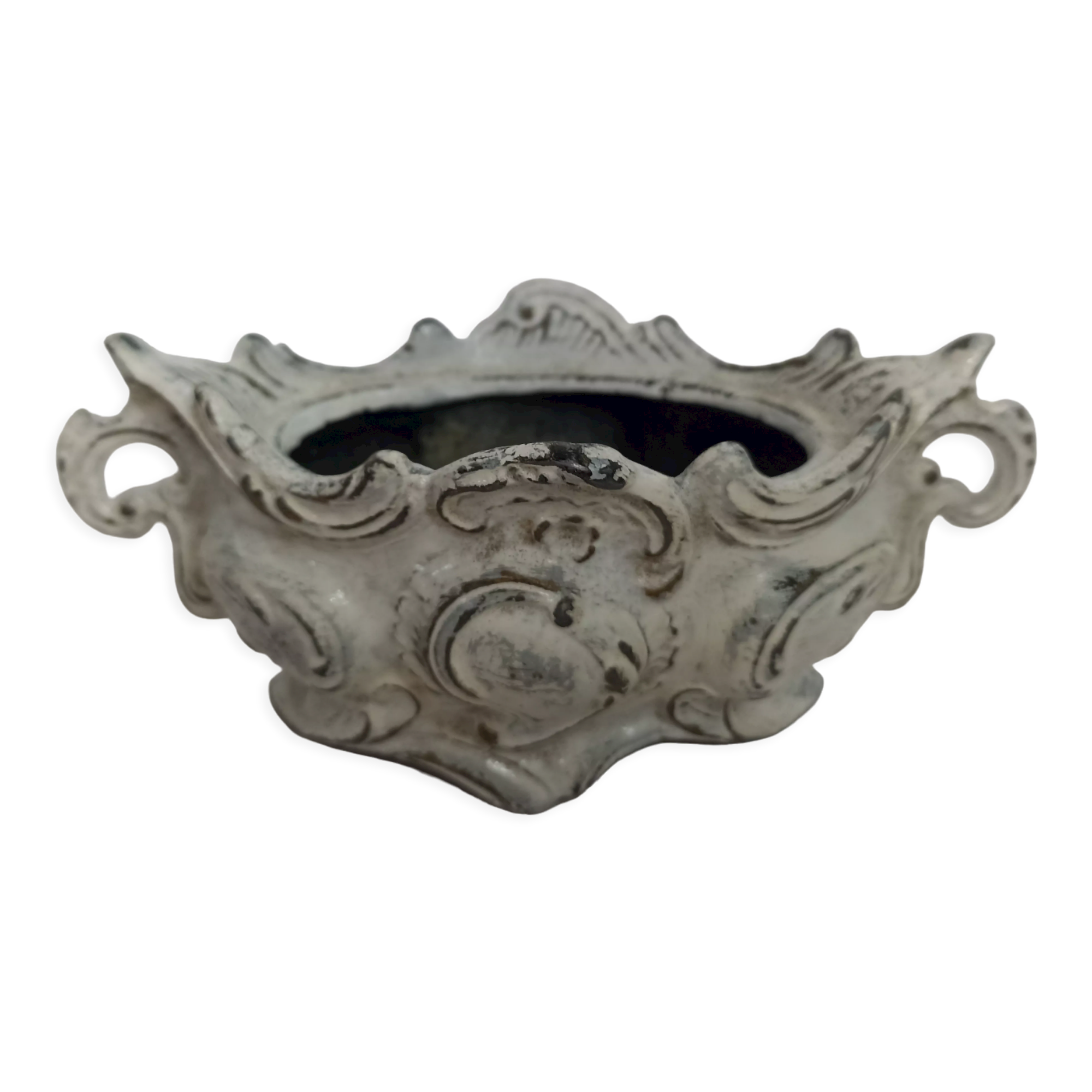 Old patinated cast iron planter