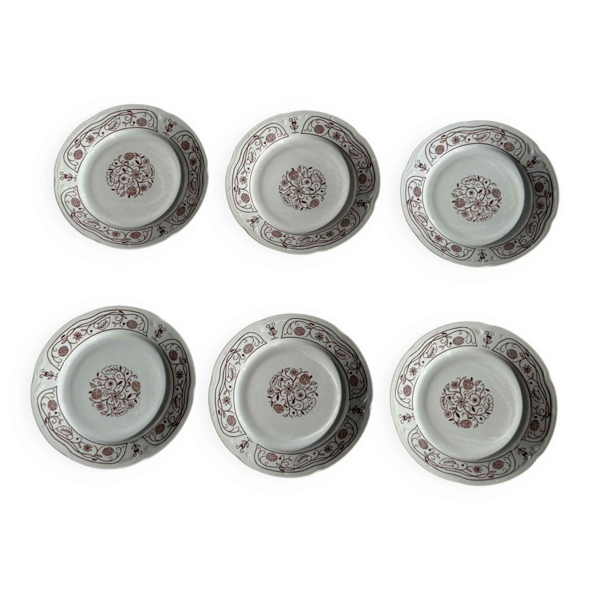 Set of 6 vintage dessert plates made in Poland with a plant motif.