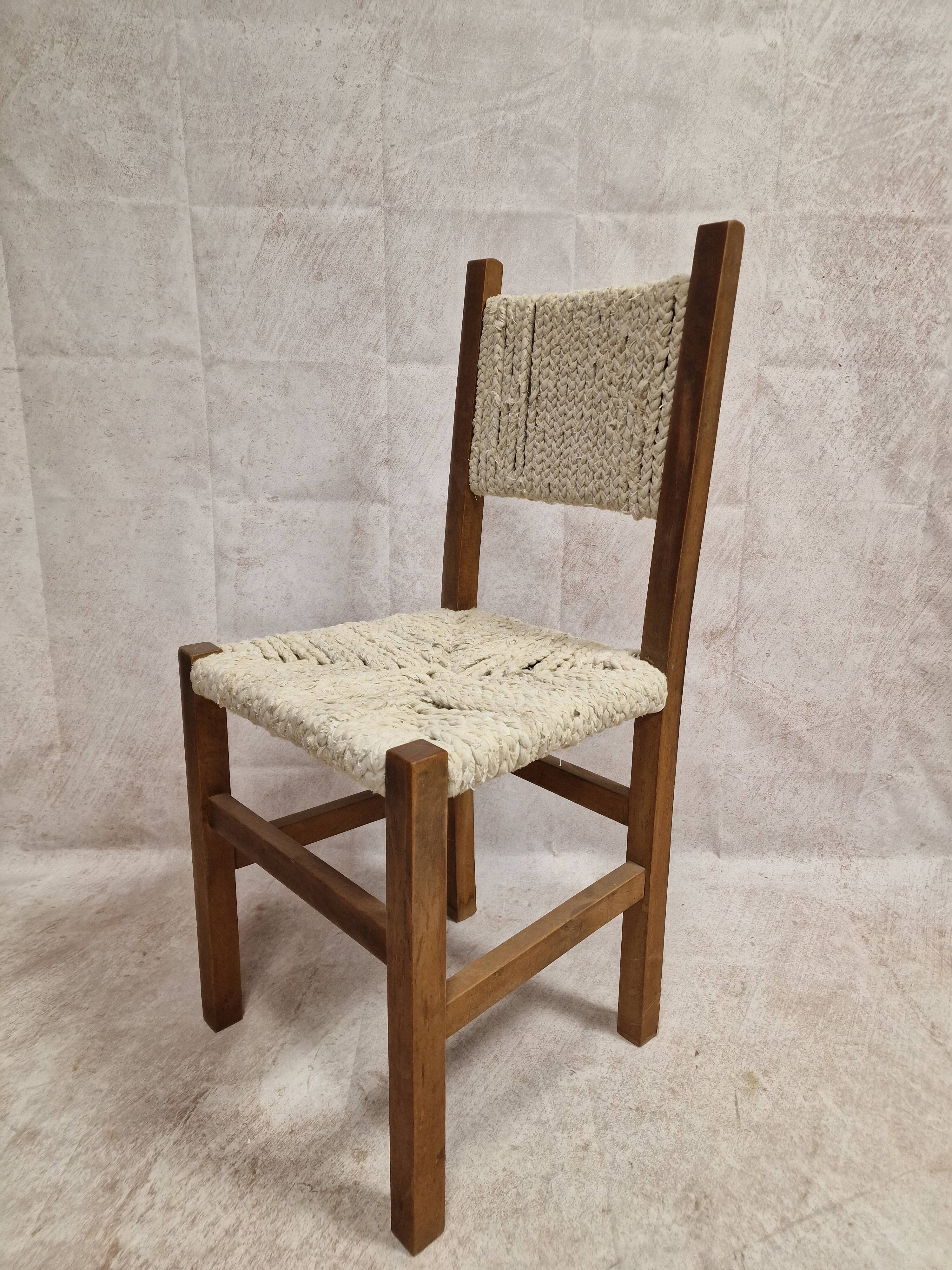 Wooden chair with woven rope seat