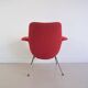 Red armchair with metal legs