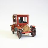 Vintage tin car with pull lever