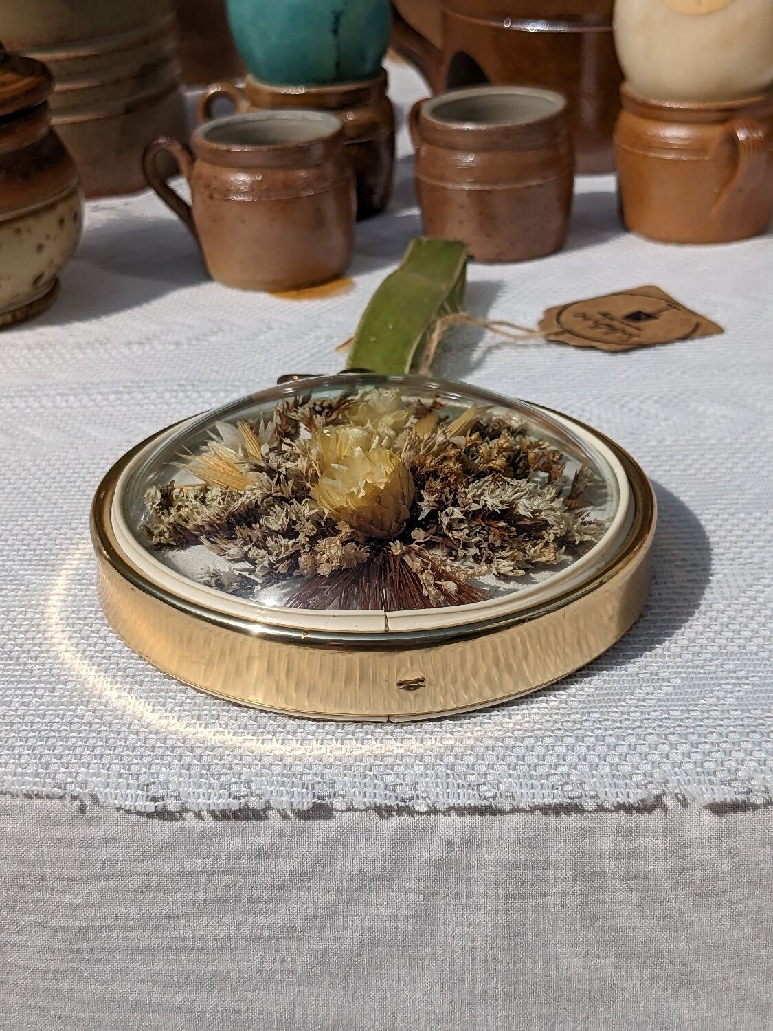 Domed frame of dried flowers