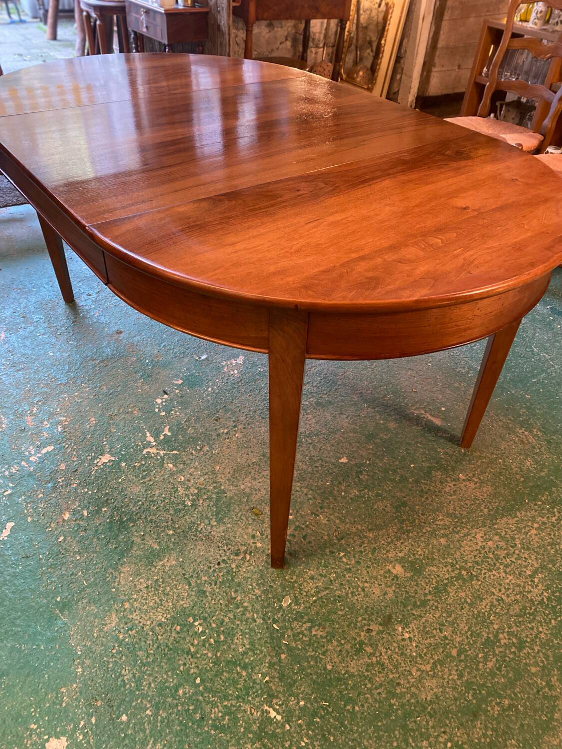 Louis XVI style oval walnut extendable table