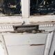 Old door with wrought iron grille