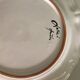 Moustiers porcelain plate with bird decor