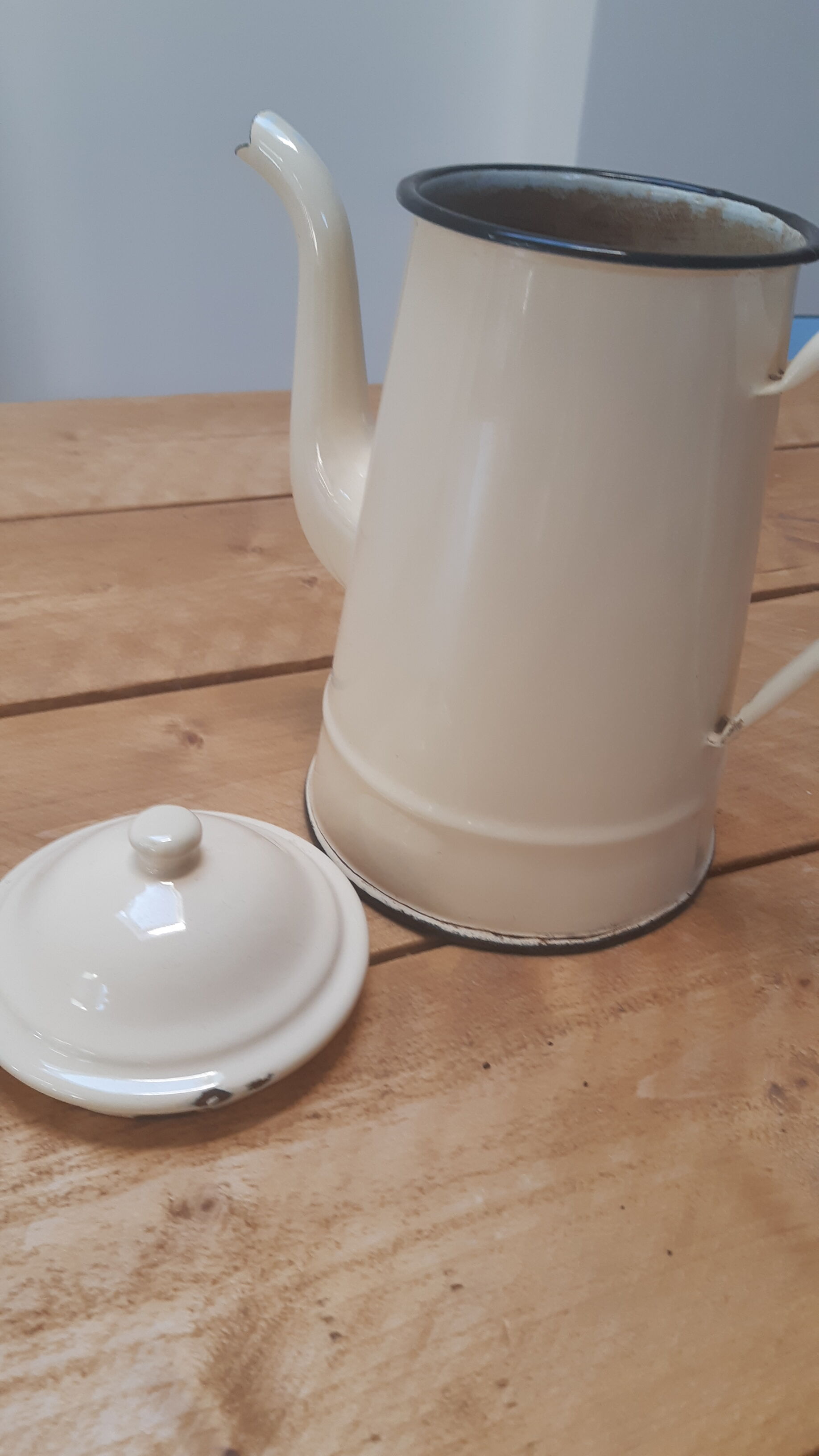 Cream metal teapot