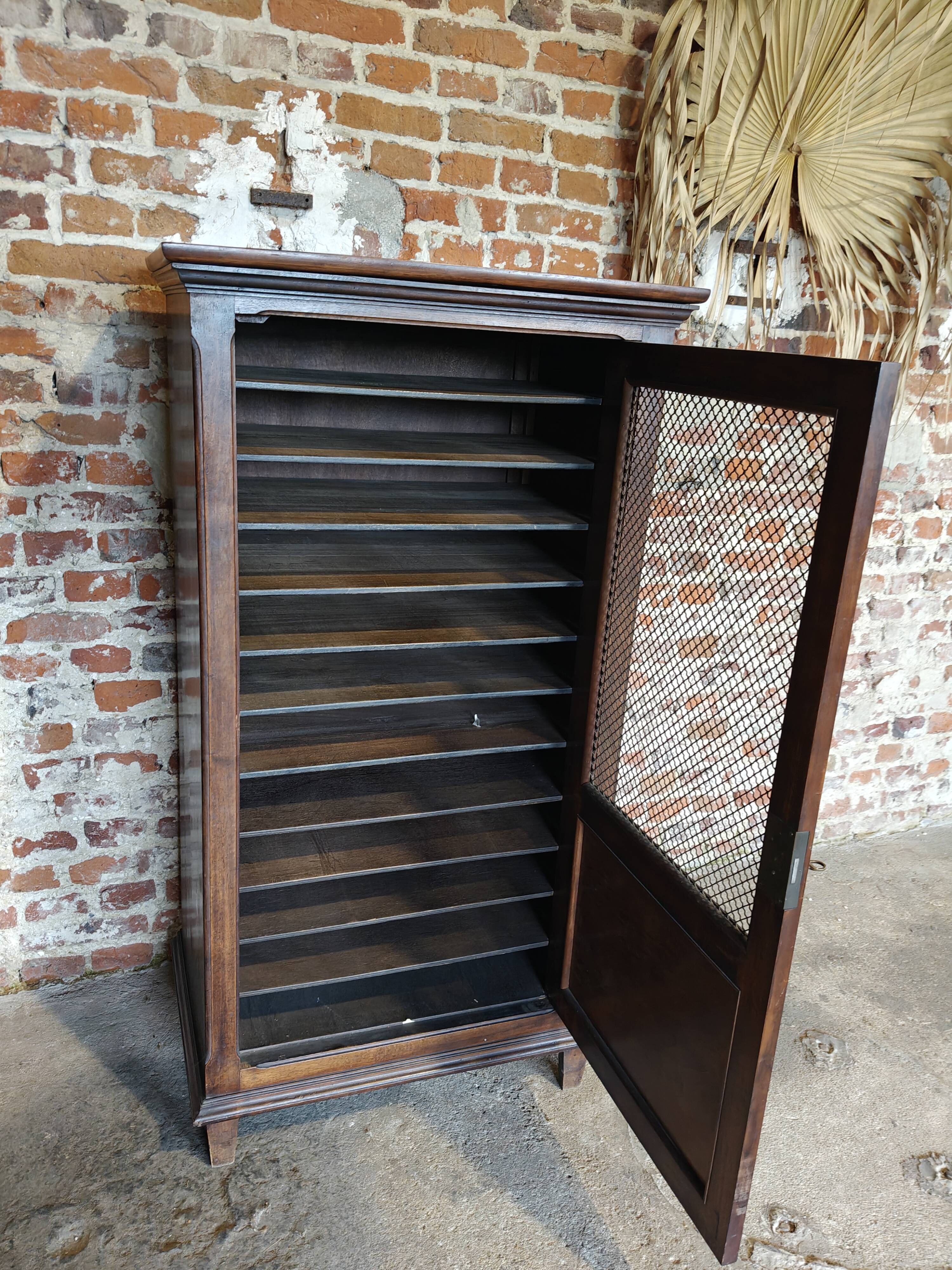 Antique printer's style wooden workshop furniture – mesh door