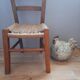 Wooden children's chair, rope seat, circa 1950