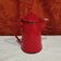 Red enamelled sheet metal coffee maker