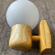 Vintage wall light in solid beech and opaline from the 70s-80s.
