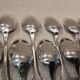 11 silver-plated dessert spoons by Christofle, Cluny pattern, striped