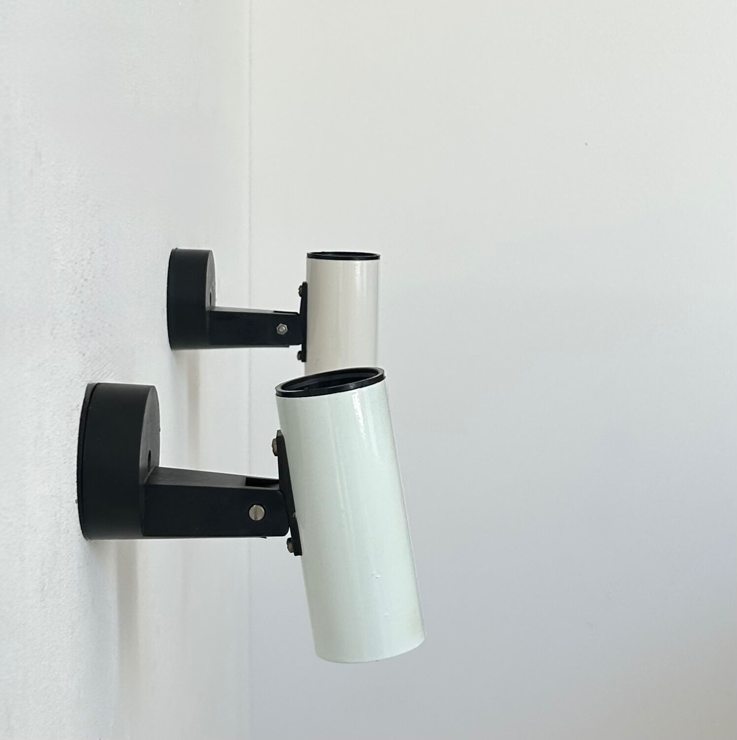 Pair of vintage adjustable wall lights, white metal, France 1970