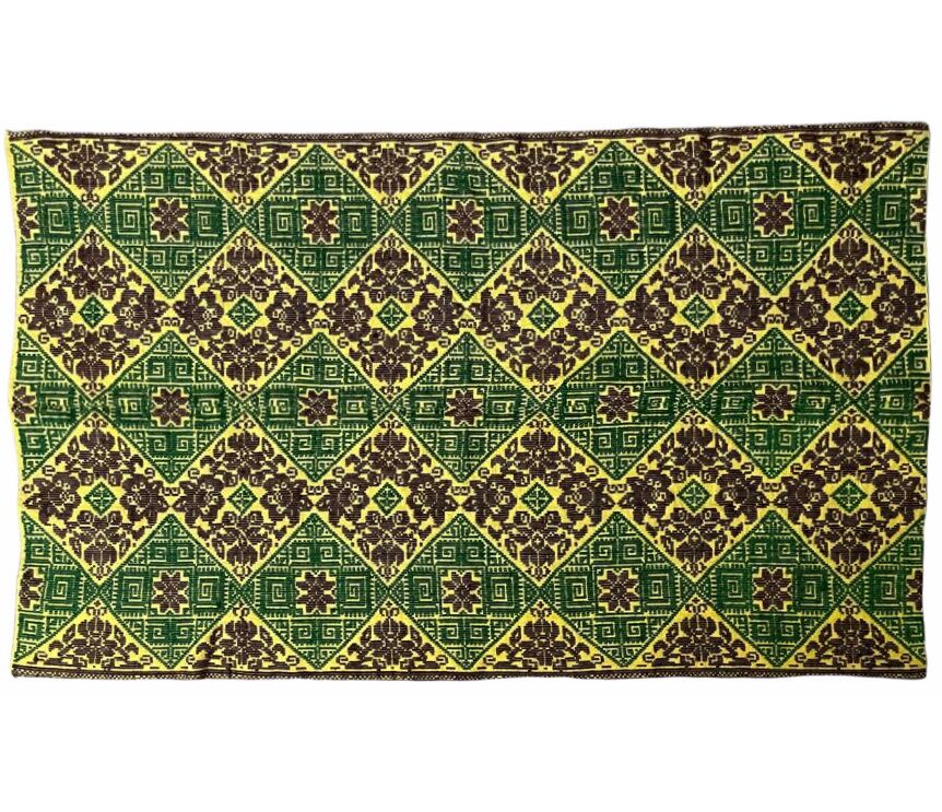 Green and yellow handmade rug with delicate colourful flowers