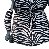 Voltaire armchair upholstered with zebra pattern fabric