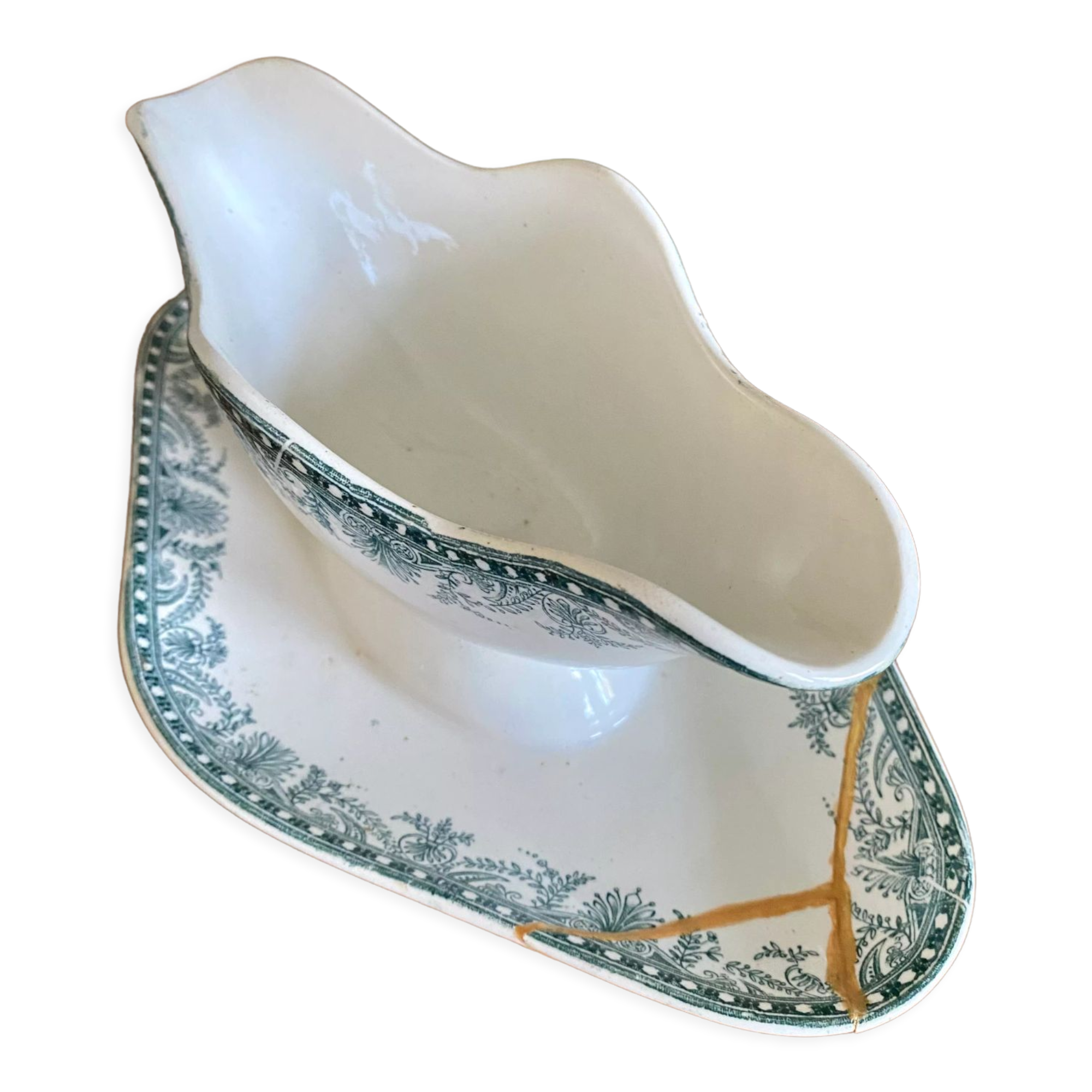 Old gravy boat repaired with the Japanese kintsugi technique