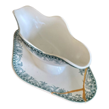 Ancienne saucière réparée avec la technique japonaise du kintsugi