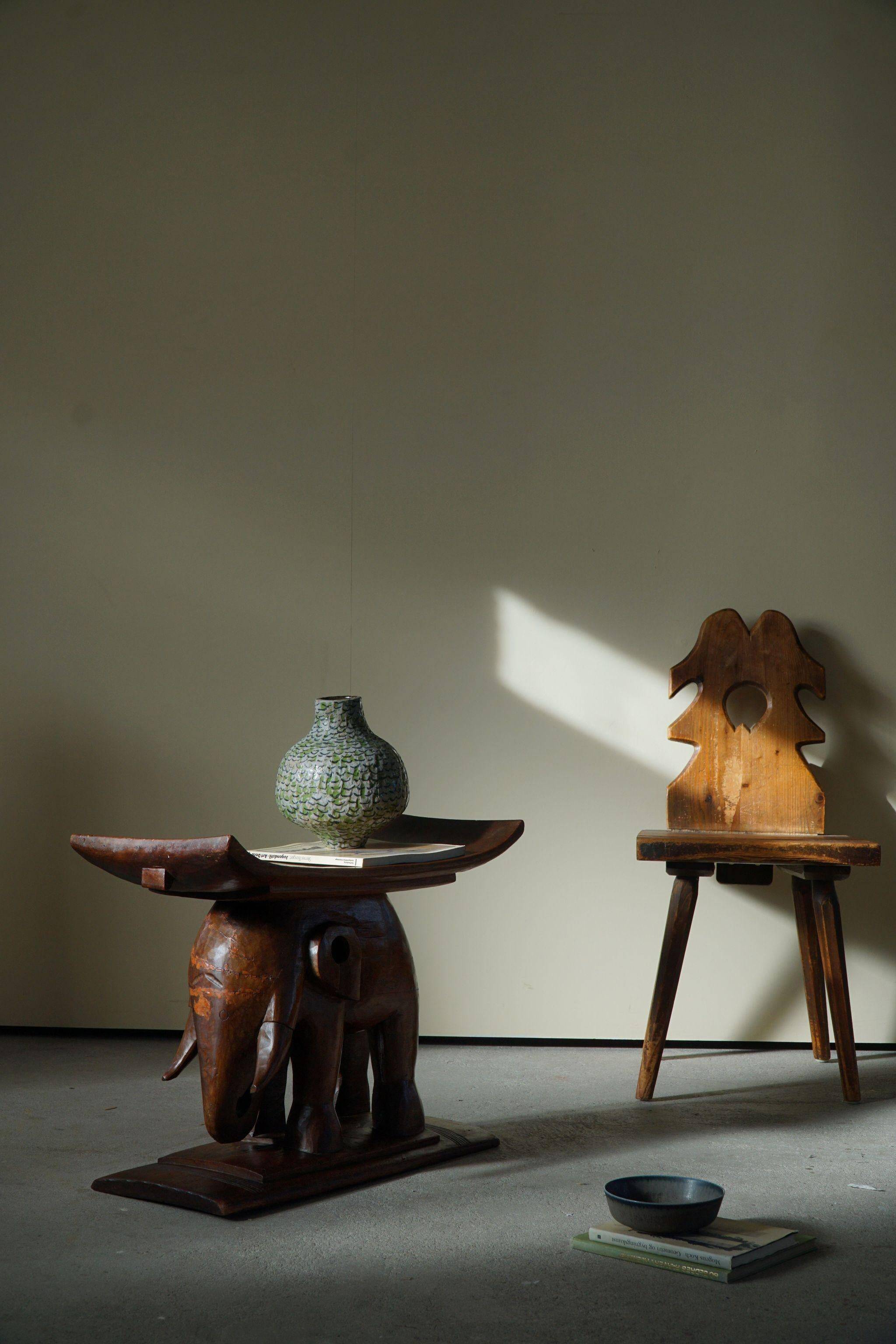African elephant stool in carved wood, mid-century in Wabi Sabi style, 1940s.