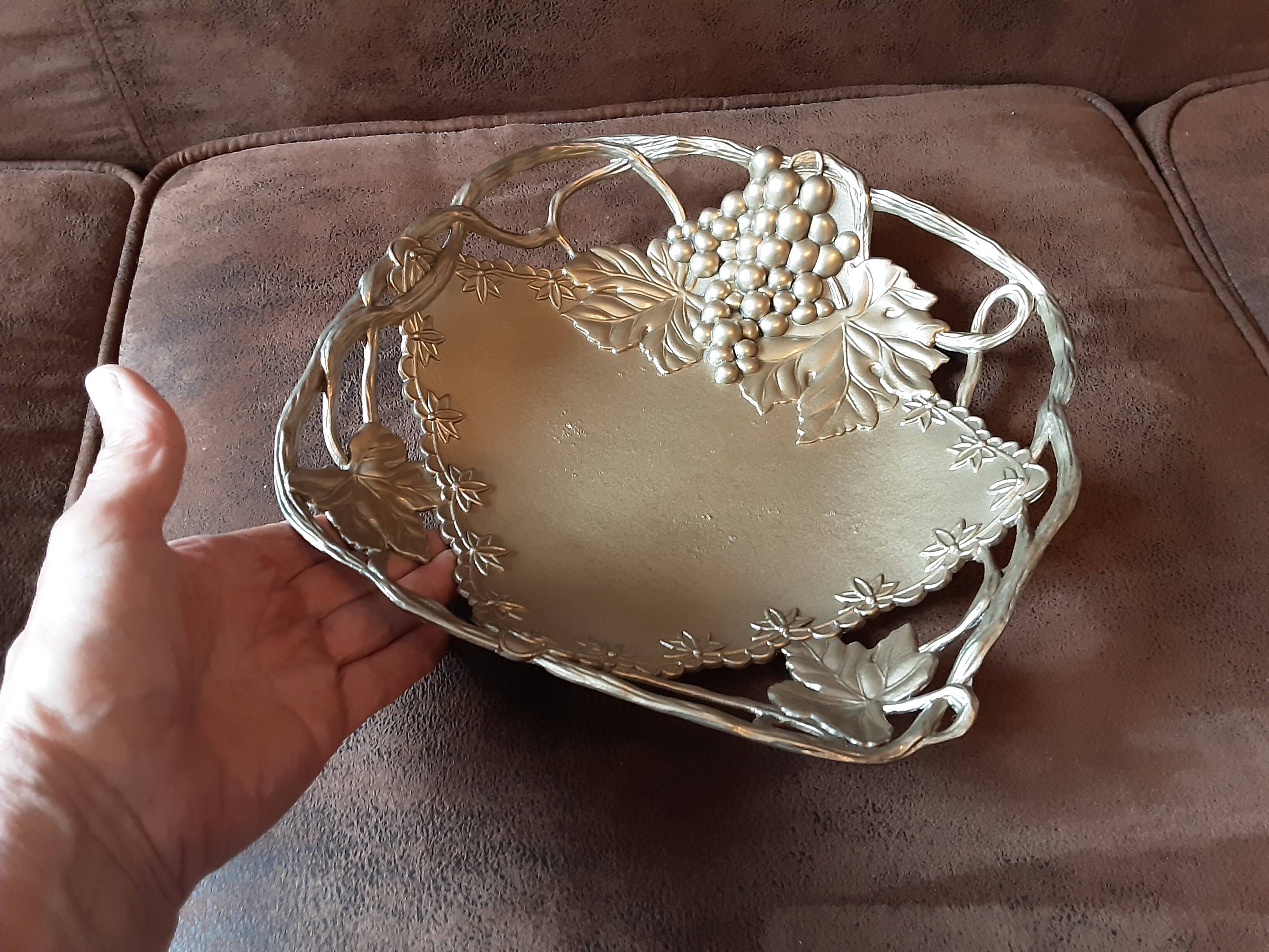 Metal basket with vine decor