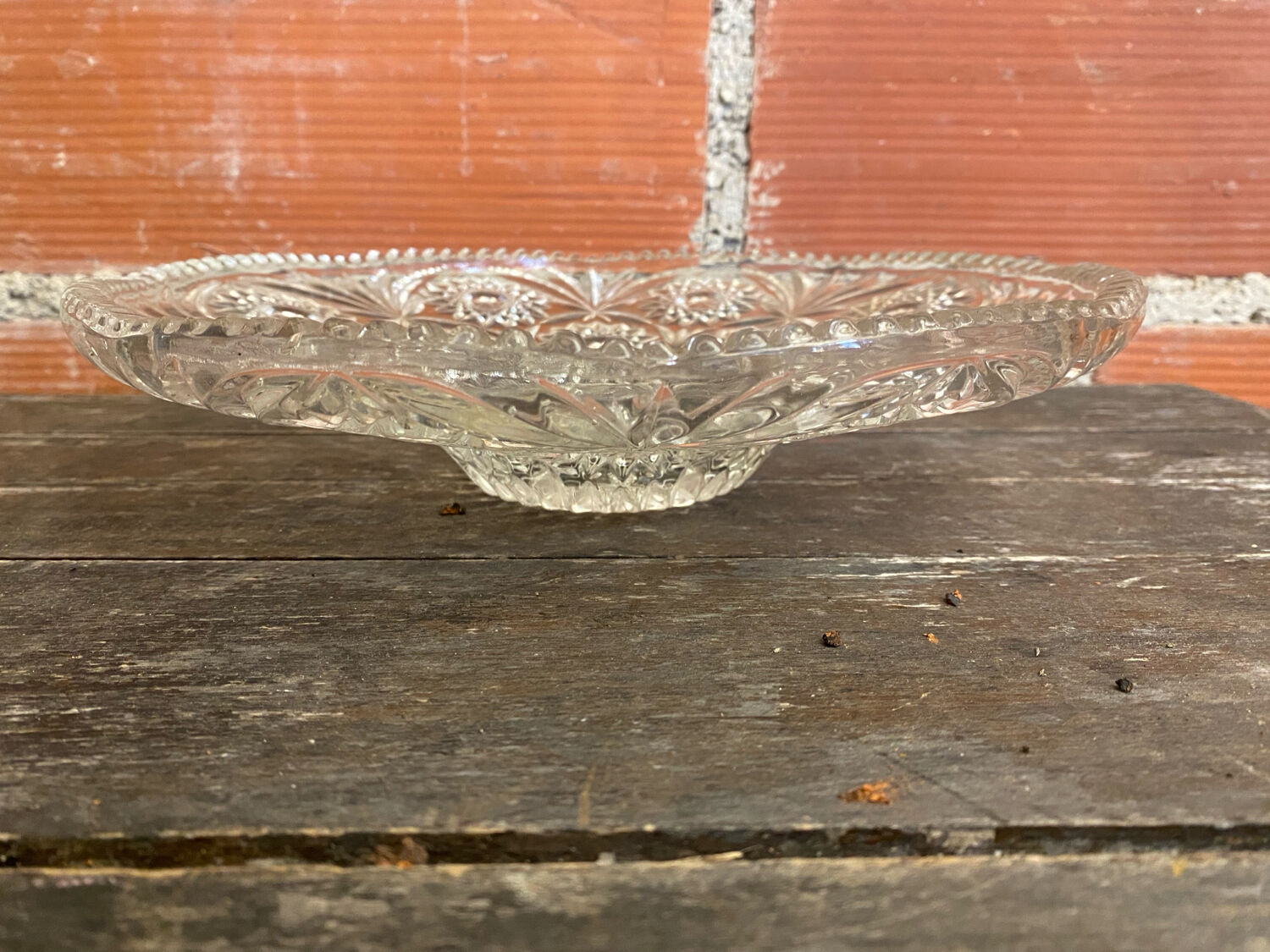 Cut glass fruit bowl with carved star decoration.