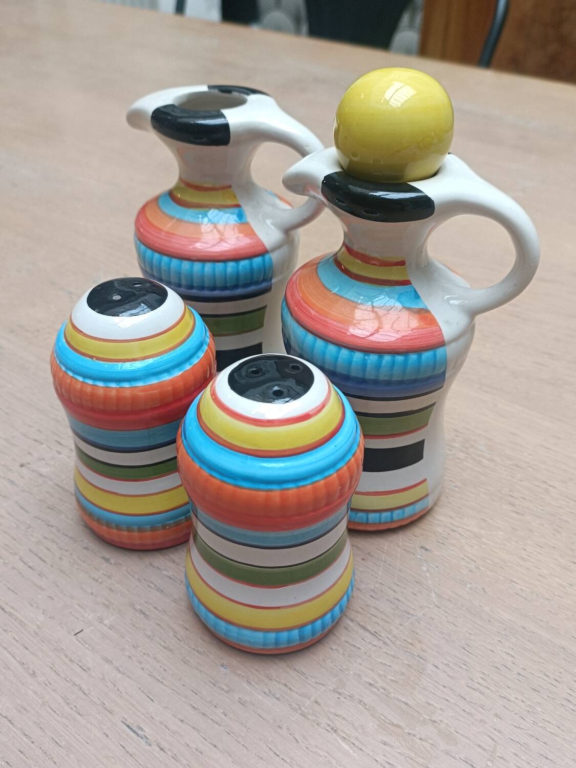 Vinegar and oil set, salt shaker and pepper shaker.