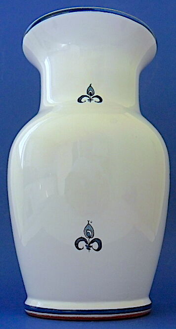 White-blue earthenware vase with stylized plant decoration