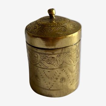 Old round box in chiseled brass