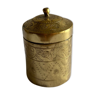 Old round box in chiseled brass