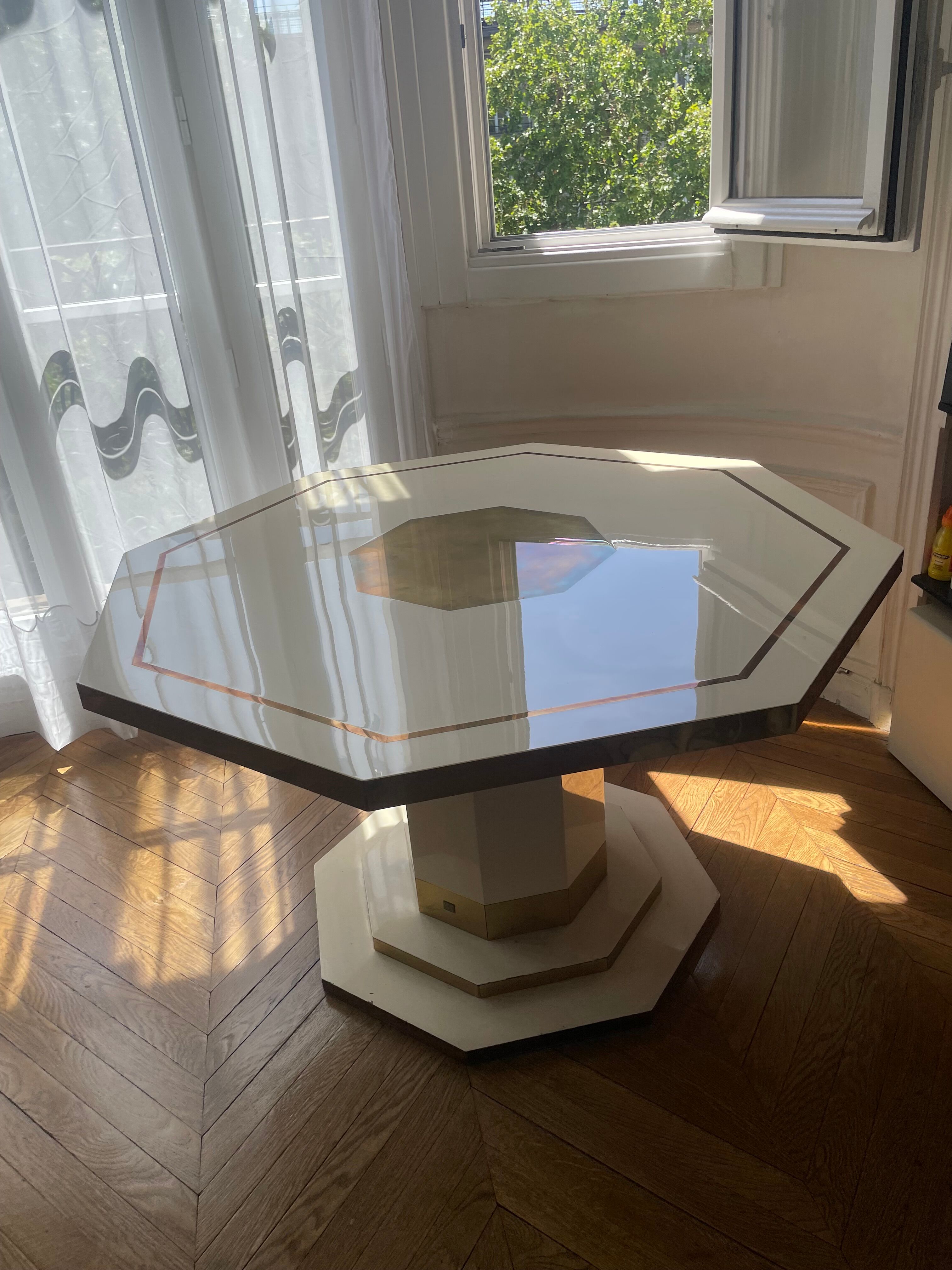 Octagonal table by Jean Claude Mahey
