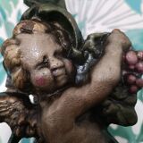 Cast iron door block cherub