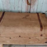 Old suitcase in canvas, wood and metal