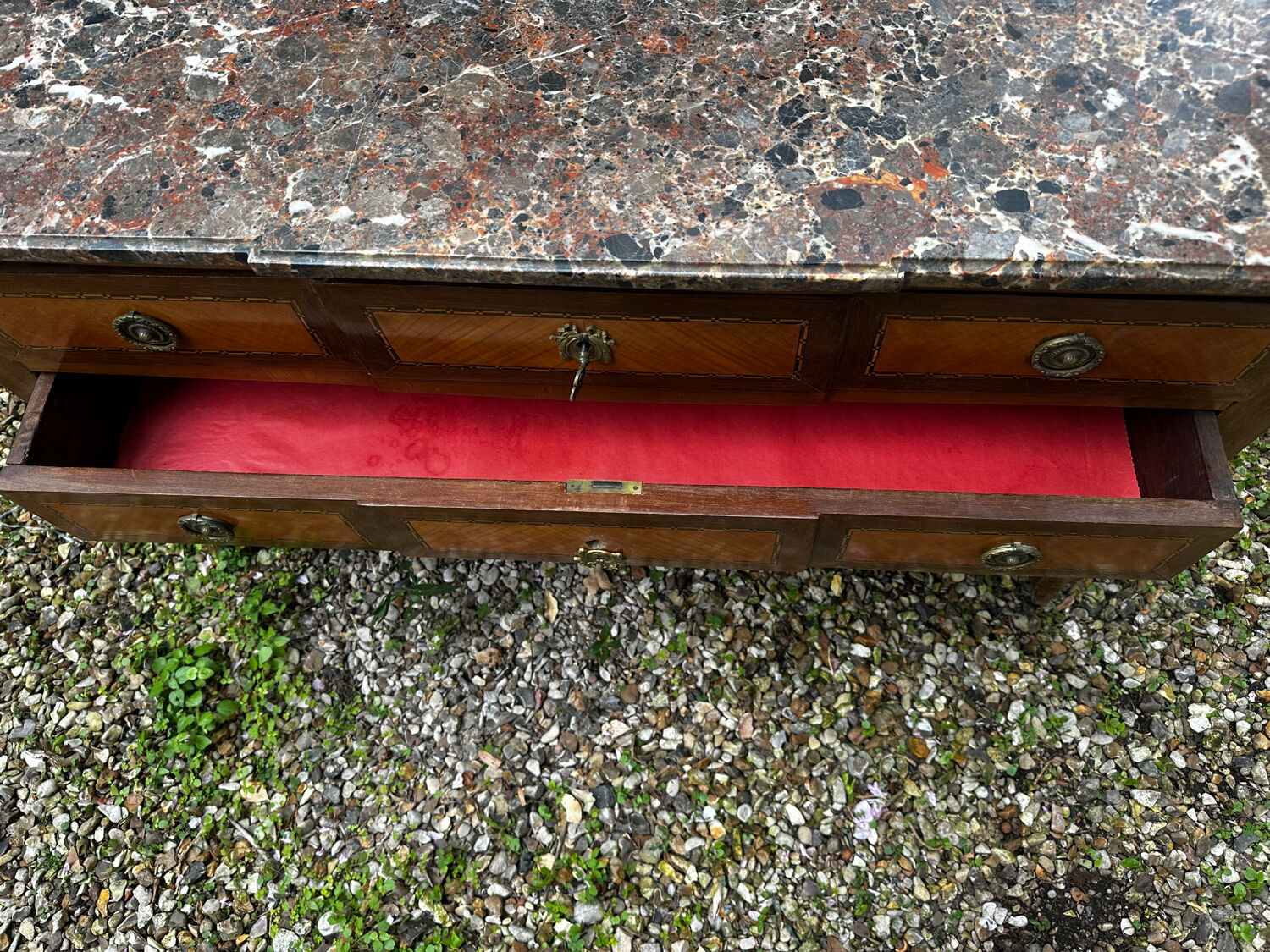 Transitional Louis XV - Louis XVI commode from the 19th century.