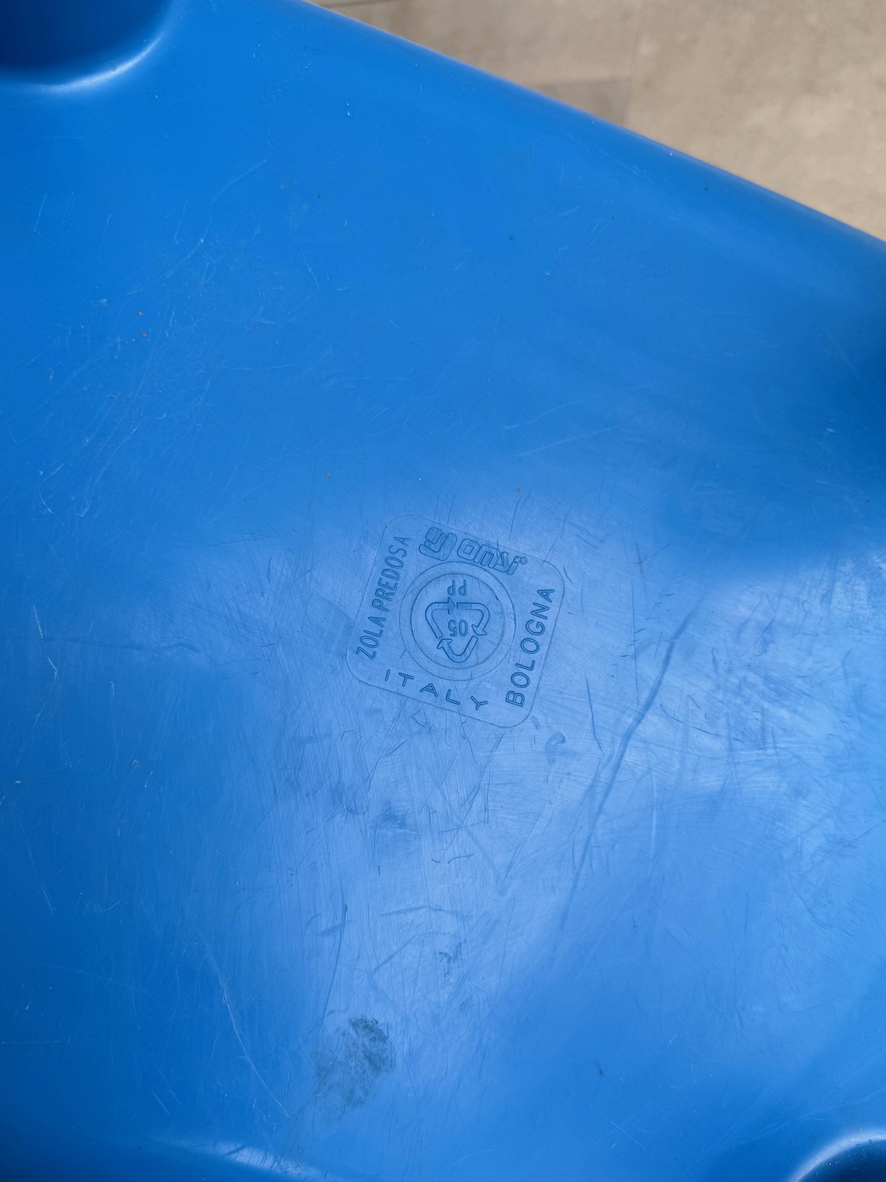 Blue plastic space age kids chair, bold italian design