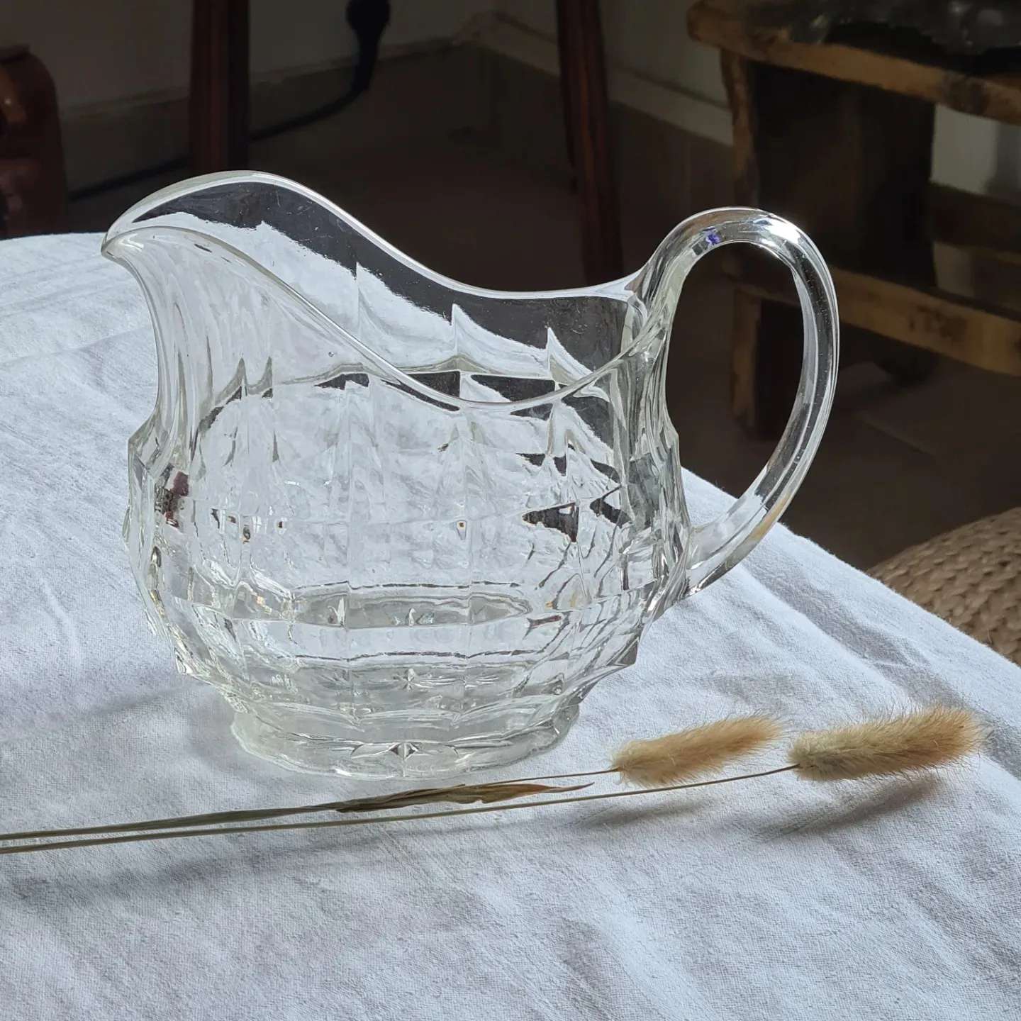 Faceted antique glass pitcher
