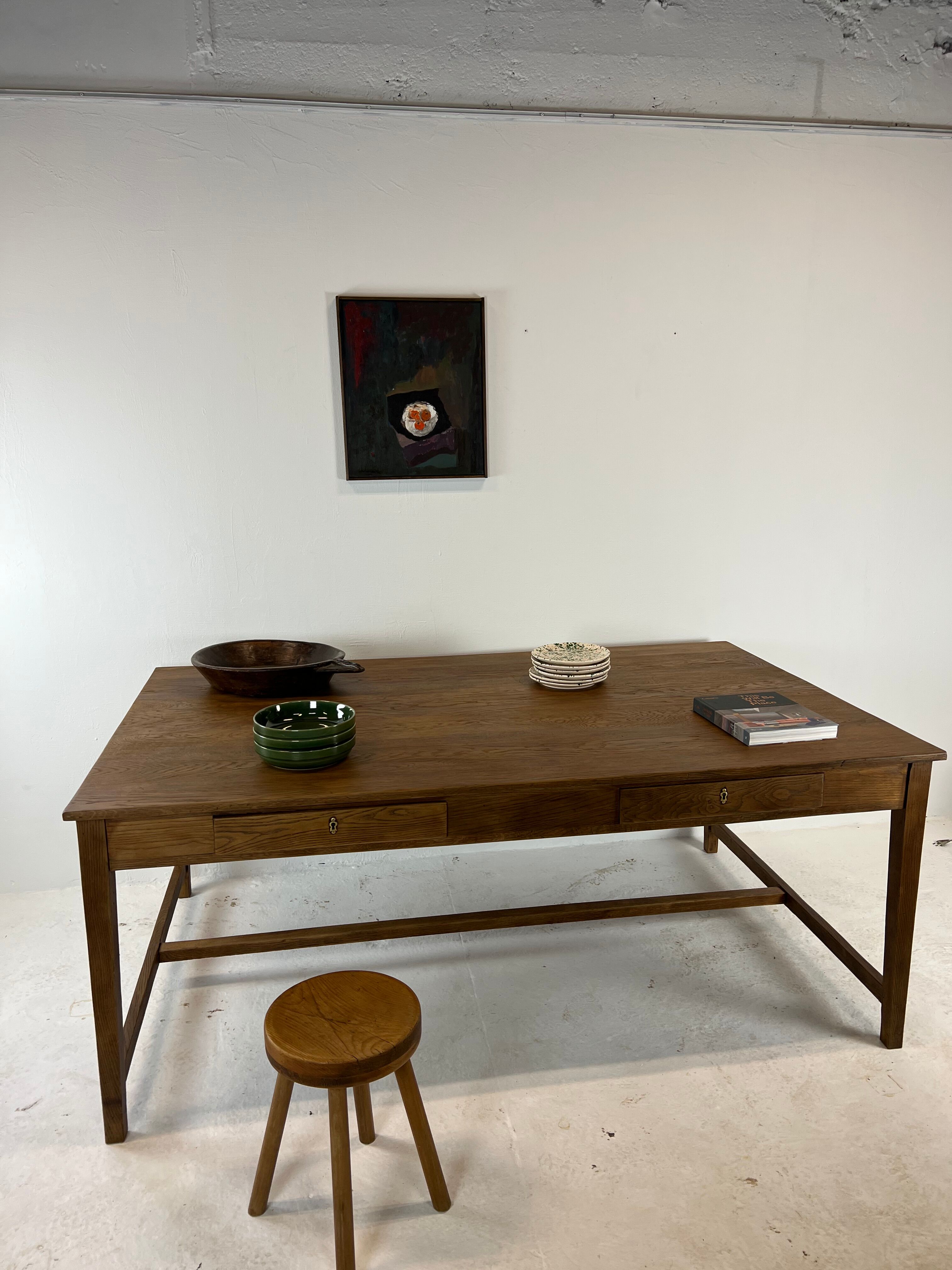 Two-sided oak work table, with 4 drawers