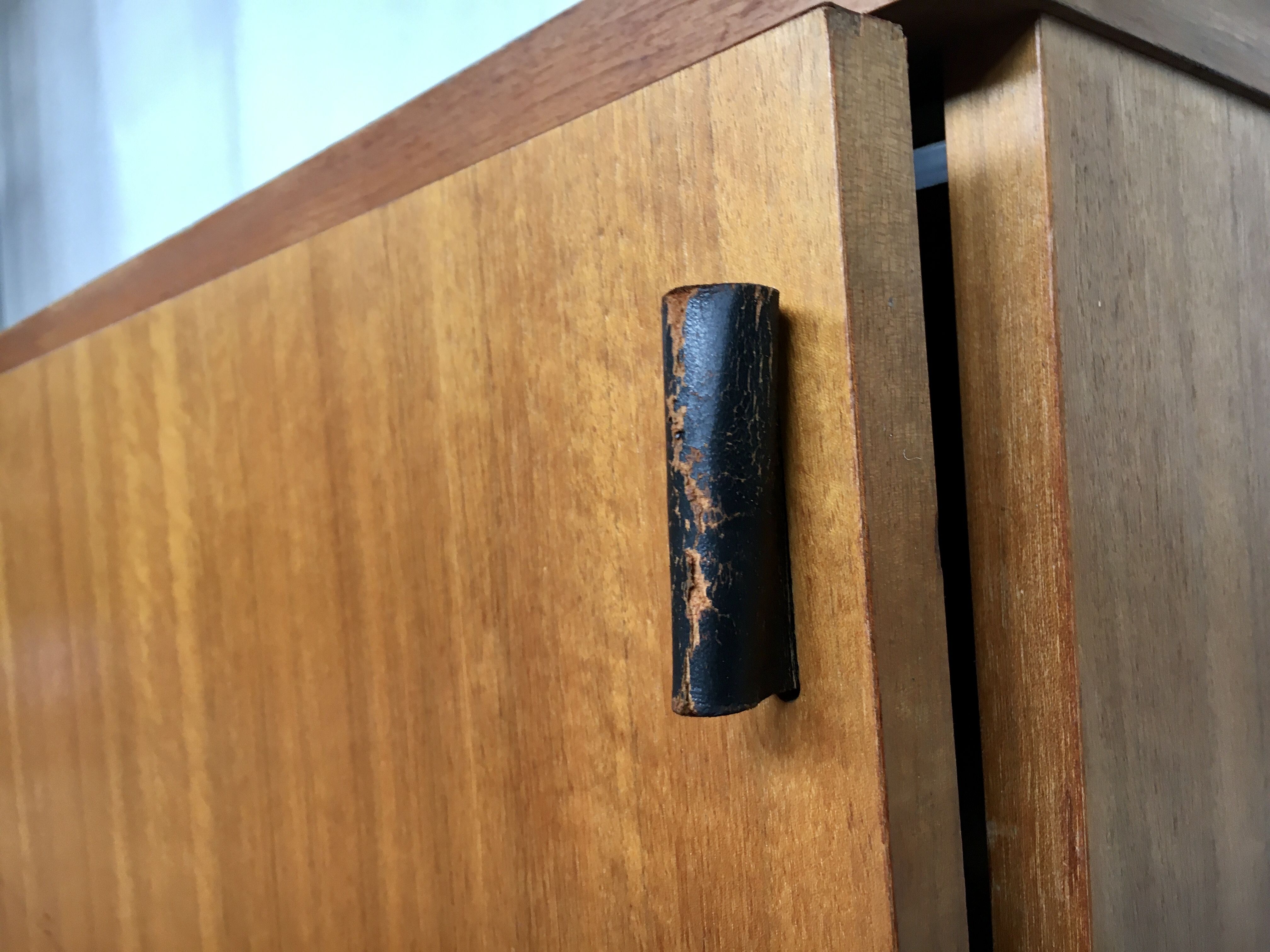 Sideboard in teak feet chrome sliding doors by Voko in 1960