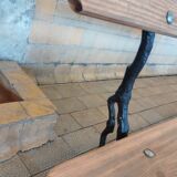 Antique garden bench with cast iron legs