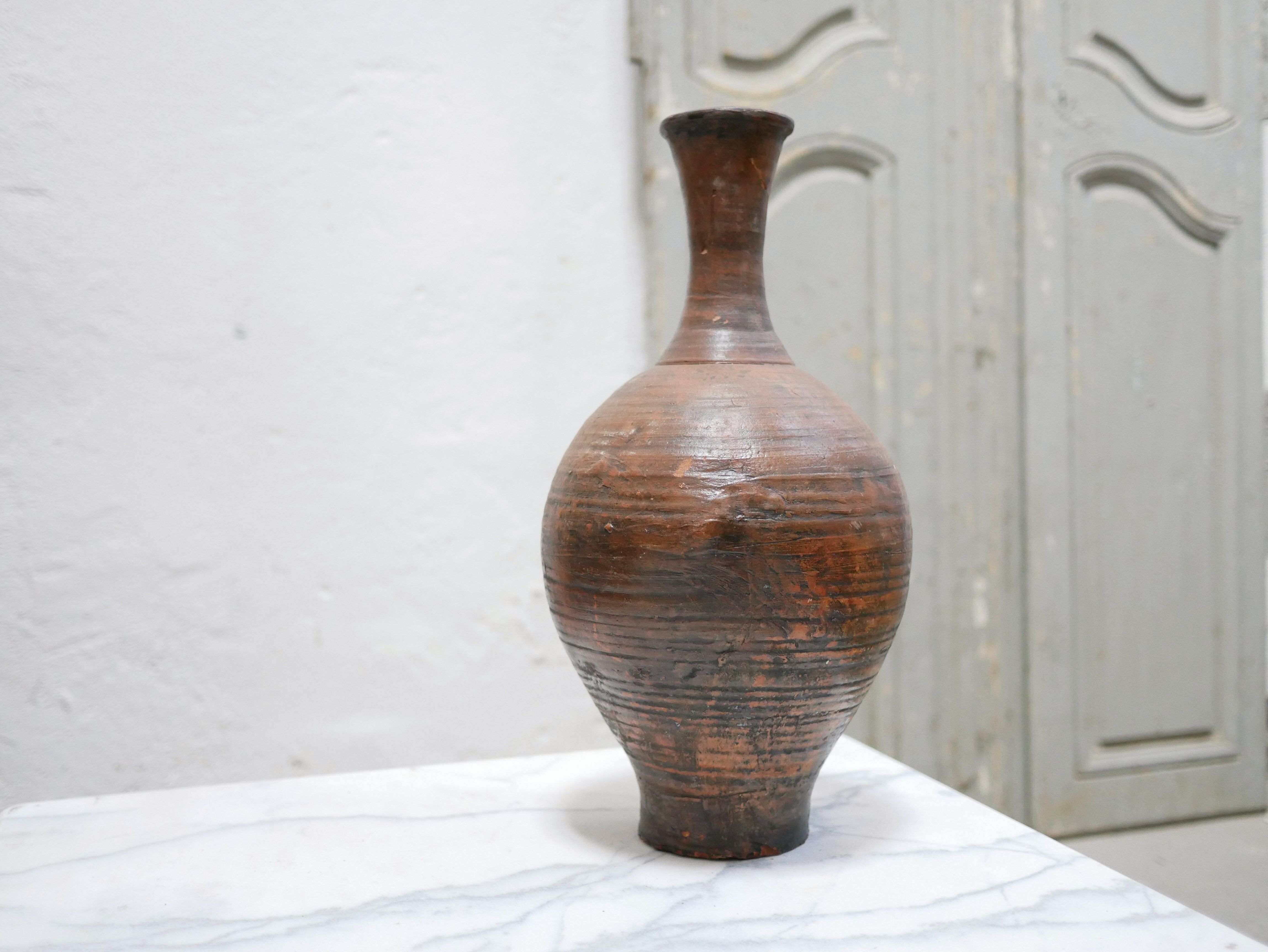 Vintage glazed terracotta jar