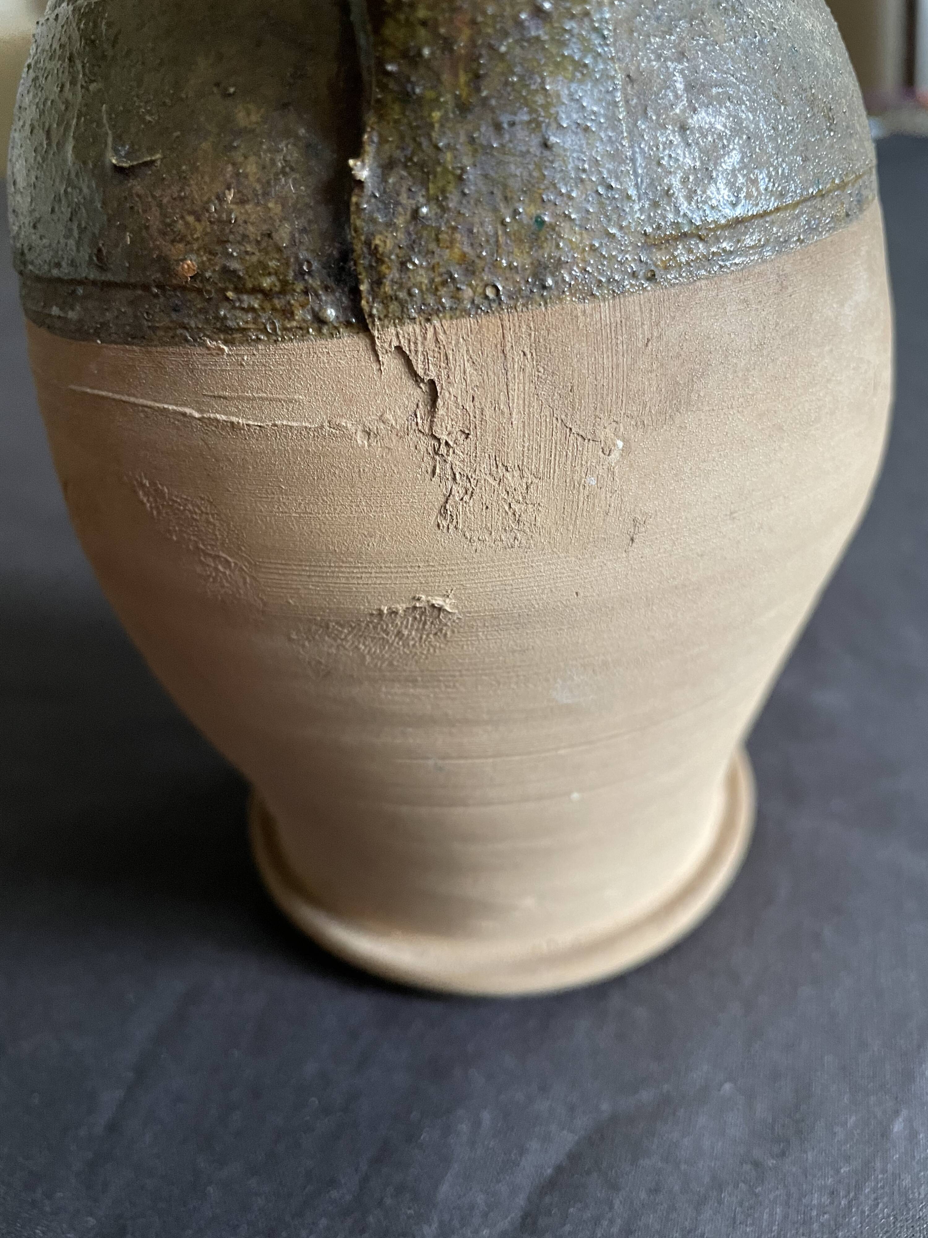 Persimmon glazed terracotta oil jar