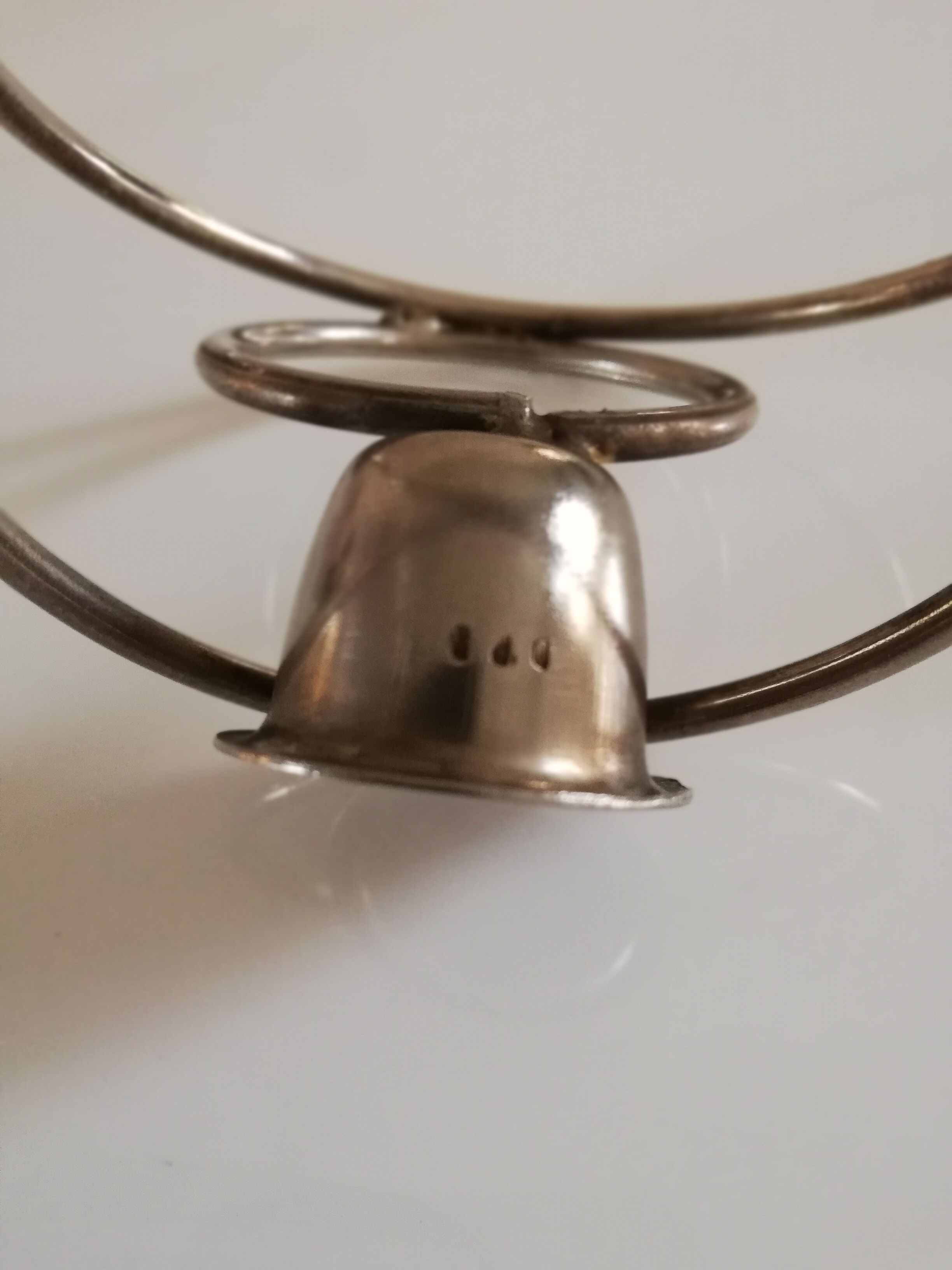 Pair of white metal candle holders