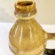 Enameled ceramic bottle with handle