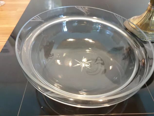 Art Deco brass cup and its engraved saucer.