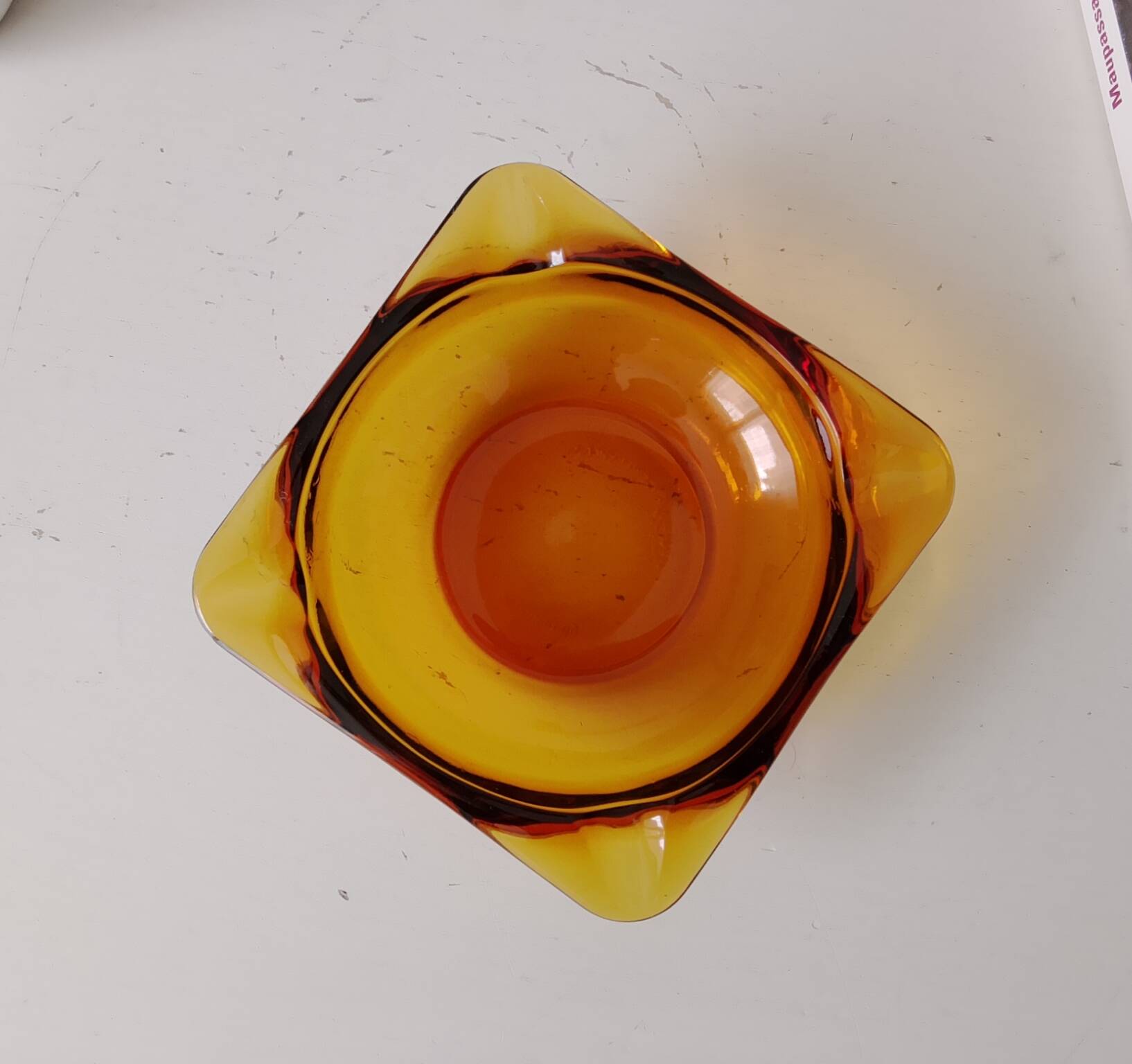 Vintage amber Duralex ashtray from the 1970s.