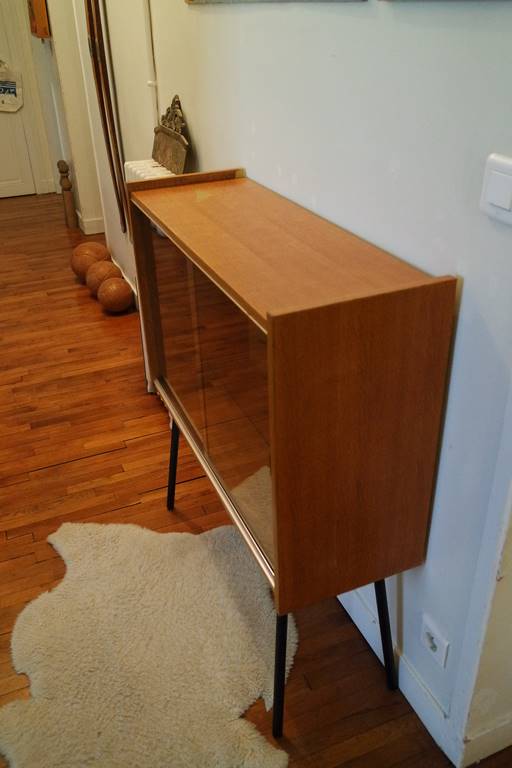 Small window on high metal feet