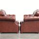 Vintage set of 2 cowhide leather Chesterfield armchairs in a brown colour