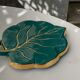 Grained in the shape of vintage dark green enamelled ceramic sheet
