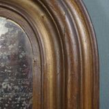 Old French fireplace mirror with beautiful ornament