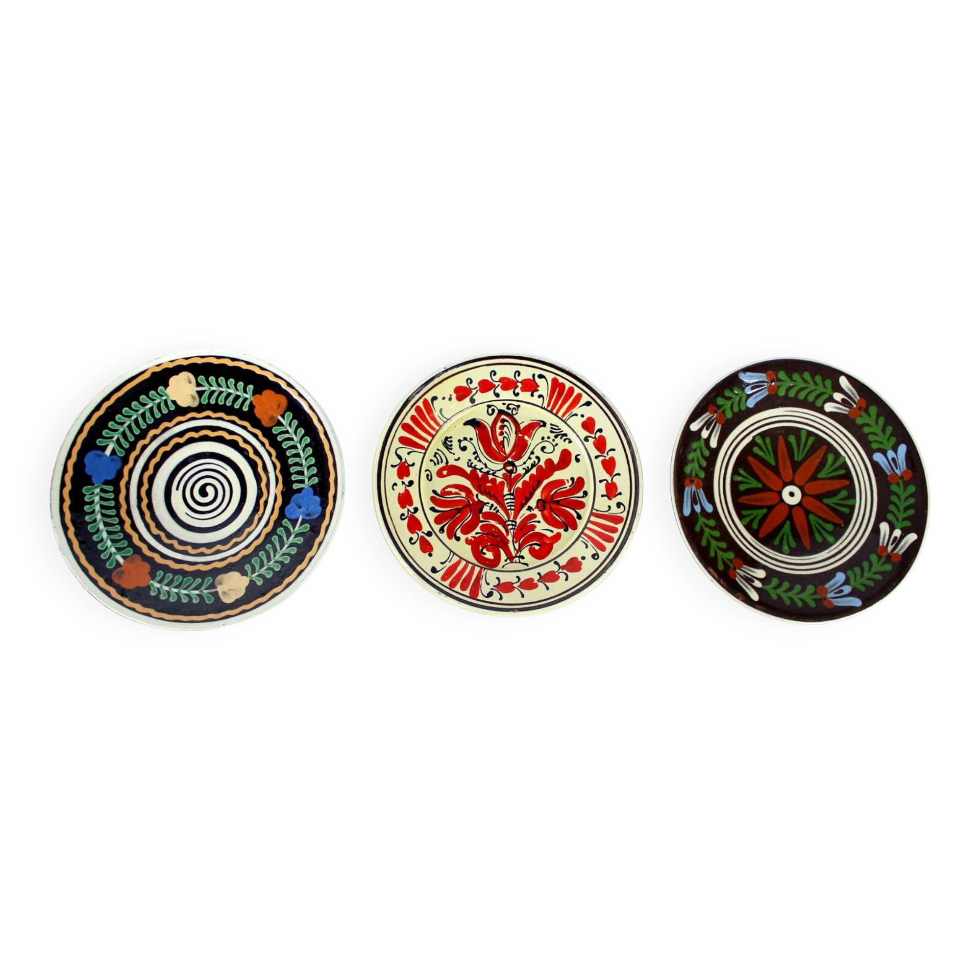 Set of three vintage folk art ceramic wall plates, Czechoslovakia and Romania.